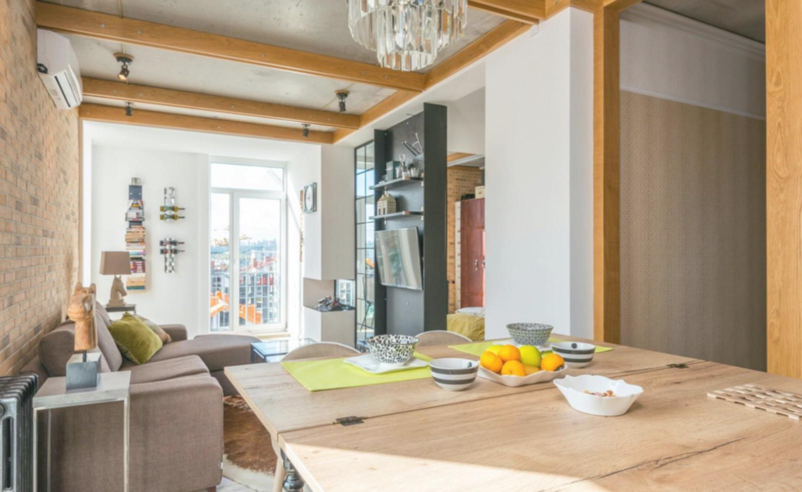 Modern real estate marketing workspace with digital tools and property listings